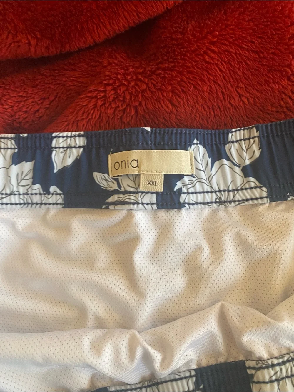 Onia Navy Swim Trunks with White Floral Print. Size XXL